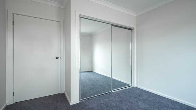 moTIONglo™ - Mirror Sliding Wardrobe Doors - Bedroom - Newcomb - Supplied & Installed by - geelongsplashbacks.com.au